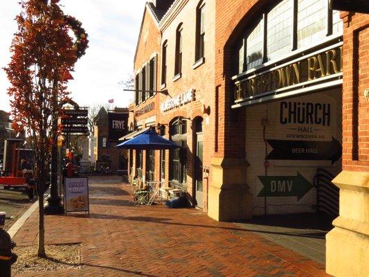 Entrance through parking lot on Wisconsin Ave NW