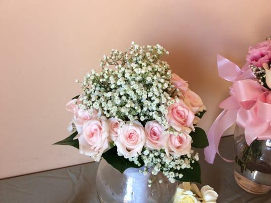 Baby's Breath Bridal bouquet with a crown of Baby Pink Roses.