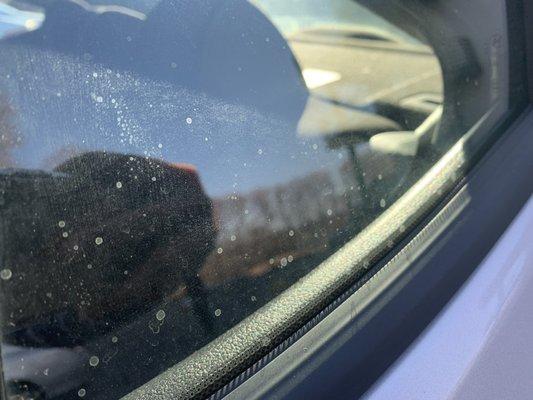 Passenger front side window - water stains