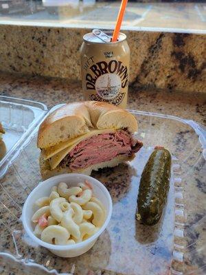 Roast Beef, American cheese with mustard on a plain bagle. Pickle. macaroni salad I won't eat.