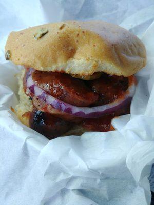 BBQ sausage sandwich on a jalapeno cheddar bun. Delicious