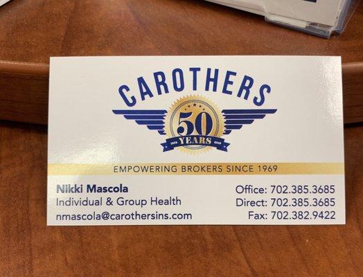 My business card. If you or anybody you know is looking for any kind of insurance Carothers is the place to call.