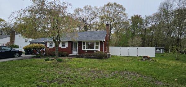 This is there  beautiful home trees on the right and left were taken down and new roof completed