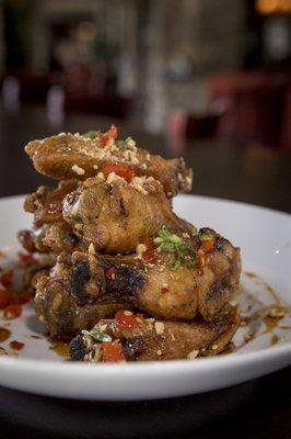 "THAI CHICKEN WINGS" piquant sweet and sour ginger sauce