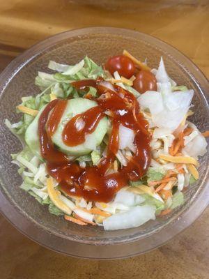 Small side salad with French dressing