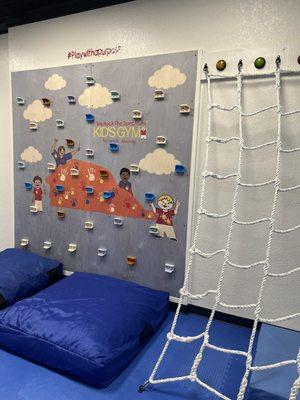 Our Rock Wall featuring THE infamous Rock (GBO!) & Rope Wall. Each have crash pads below for extra safety.