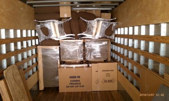 properly packing moving truck with movers protecting all household items for maximum service and protection