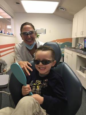 happy kiddo! He got to pick sunglasses to wear during the appt so that her light wouldn't shine in his eyes.