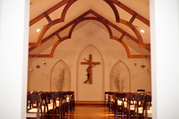 The inside of Grace Chapel with simple rustic decor