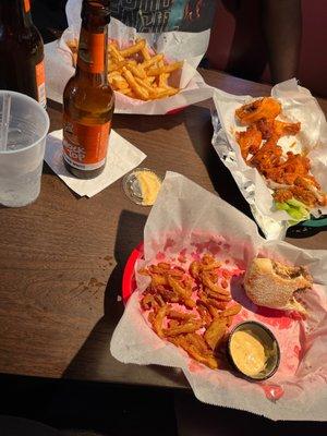 10 Hot wings and basket of fries Philly cheesesteak with onion straws