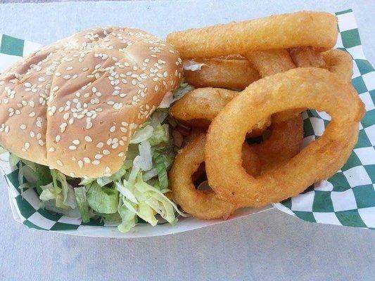 Trail boss burger with a side of onion rings