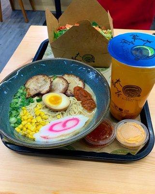 Spicy Tonkotsu broth ramen with pork and i added corn And InfruTea - peach flavor with passion fruit boba.