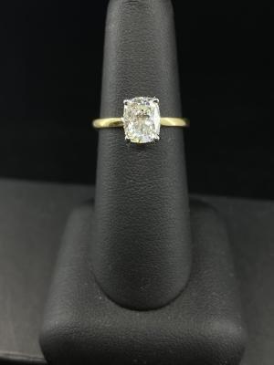 Elongated cushion cut with a hidden halo