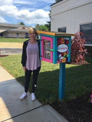 Little library painted by Tabby Woody