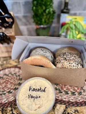 Fresh box of bagels and veggie cream cheese.