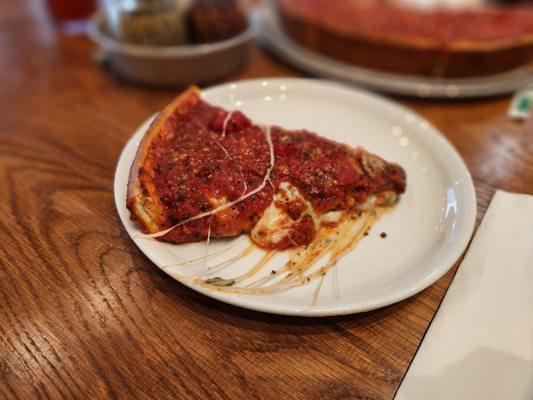 Spinach and mushroom deep dish slice