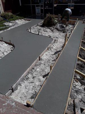 Freshly Poured Walkway and Retaining wall