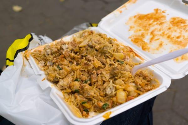 Combo over rice w/ white and extra hot sauce, also chick peas -- after stirring everything up