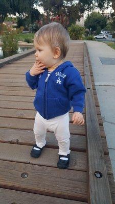 Her first big girl shoes  and Dodger sweatshirt -  both from Noodles