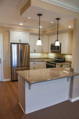 Apartments have beautiful granite countertops and modern appliances.