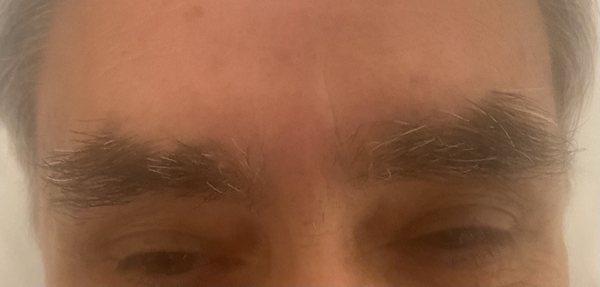 My male clients eyebrows before wax/shaping