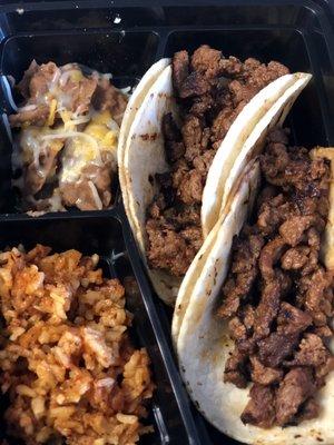 Carne Asada Tacos with Spanish rice and refried beans