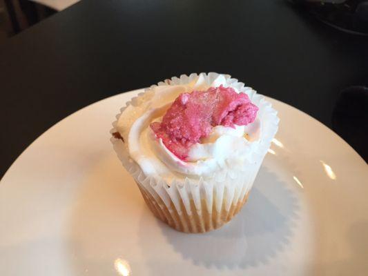 This is a Raspberry Vanilla cupcake. It had a delicious raspberry filling and raspberry icing.