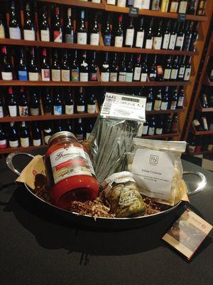 Germano's Pomodoro sauce, cuttlefish ink linguine pasta, marinated garlic with herbs, and house-made Italian crouton in a deBuyer frying pan