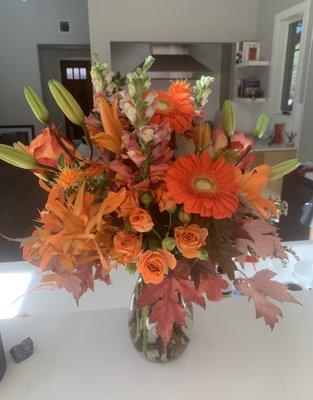 Beautiful Florist Choice fall/orange themed