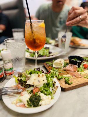 Appetizers: Pear salad (amazing) and buffalo + burrata plate w/ bread. Cocktail: Aperol Spritz