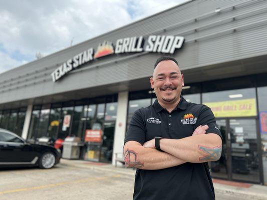 Robert, sales account manager, in front of Texas Star Grill Shop