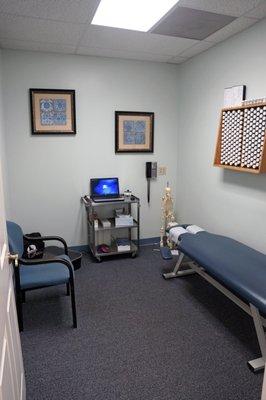 Therapy room for acupuncture, smoking cessation, nutrition response testing, custom orthotic fitting, etc.