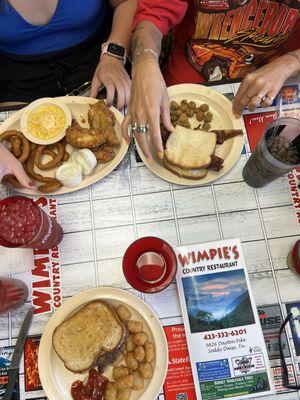 Patty melt burger, chicken fingers and blt