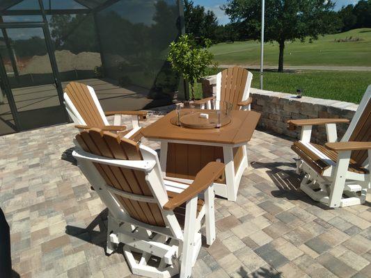 Outdoor furniture made to last.  Polywood swivel chairs with matching firepit