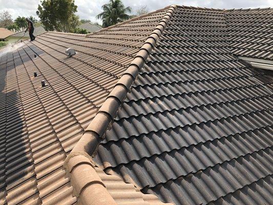 Roof being cleaned by Ryan Goetzke's Pressure Cleaning