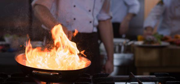 Chef Antoine Lours prepares flambees a dish