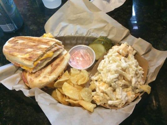 Monte Cristo panini, macaroni salad, and chips.