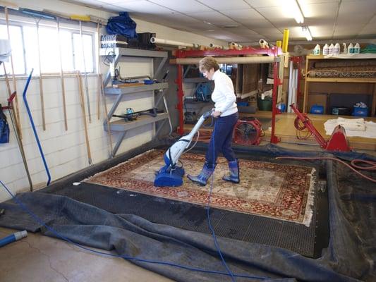 Ruth Travis, aka "The Rug Lady" is a Master Rug Cleaner and  oversees Chase's rug cleaning department.