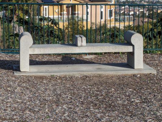 Bench by the Tribute to the Roughnecks sculpture