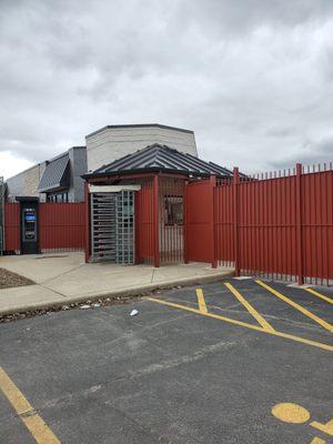 Entrance where only one person is allowed into the facility at a time. Definitely not safe let alone accessible.