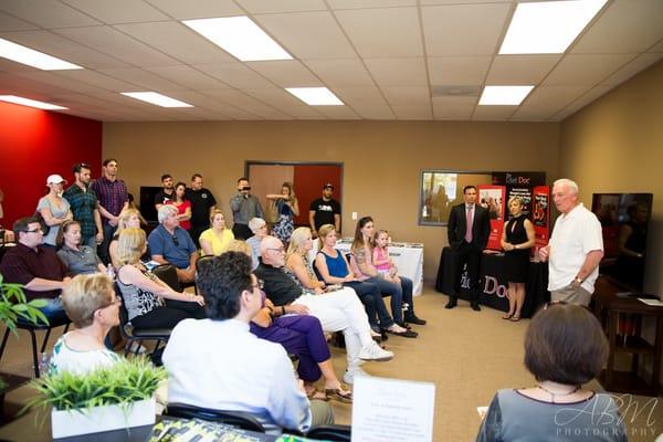 Guests listen intently as Jerry Sanders describes his personal weight loss and health journey.