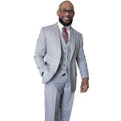 Gray 3 piece suit, matched with a Mason Blue Dress shirt and tie from Men's Mart