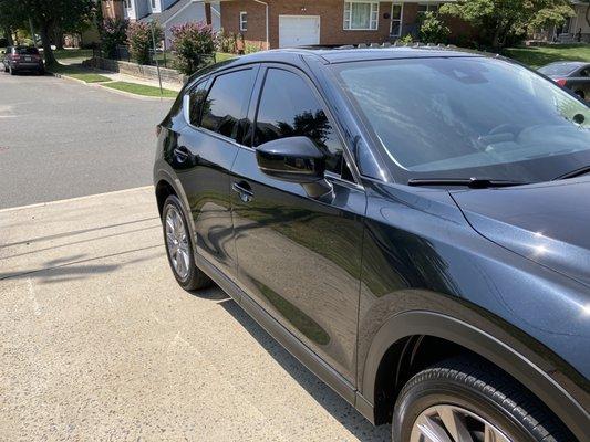 Mazda CX-5 that's been detained in and out. Also, window tinting.