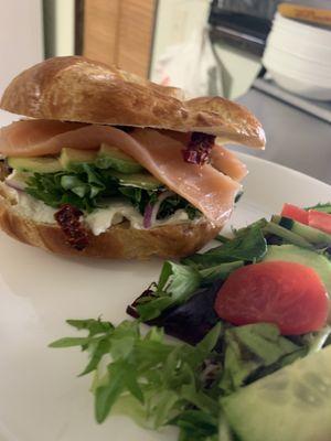 Fresh croissant with turkey ham, served alongside homemade salad--light, satisfying, and delicious!