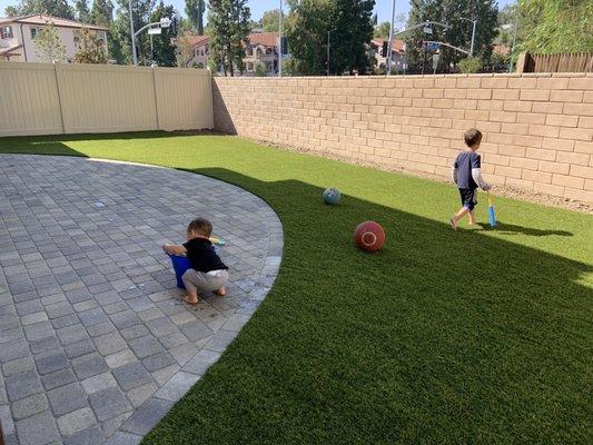 Turf, pavers & kiddos enjoy them