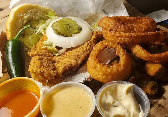 Catfish basket with onion rings and a side of fried okra