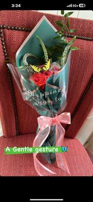 Butterfly wrapped bouquet..this is a gentle gesture for a smile, on a first of meeting w/someone