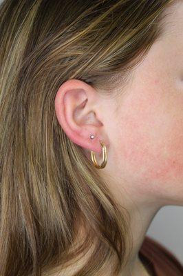 Second hole piercing with custom jewelry