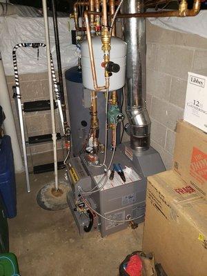 This was a new boiler installation in a small mechanical closet. 84% efficiency Laars unit