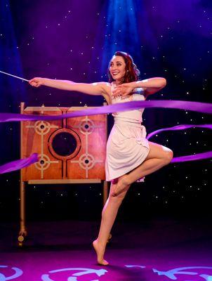 The beautiful Marlana adds grace to the stage illusions.